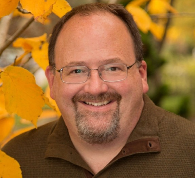 President and executive director Doctor Ben Sutter smiling