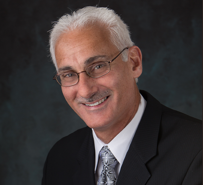 Vice president Doctor Robert Kerstein smiling